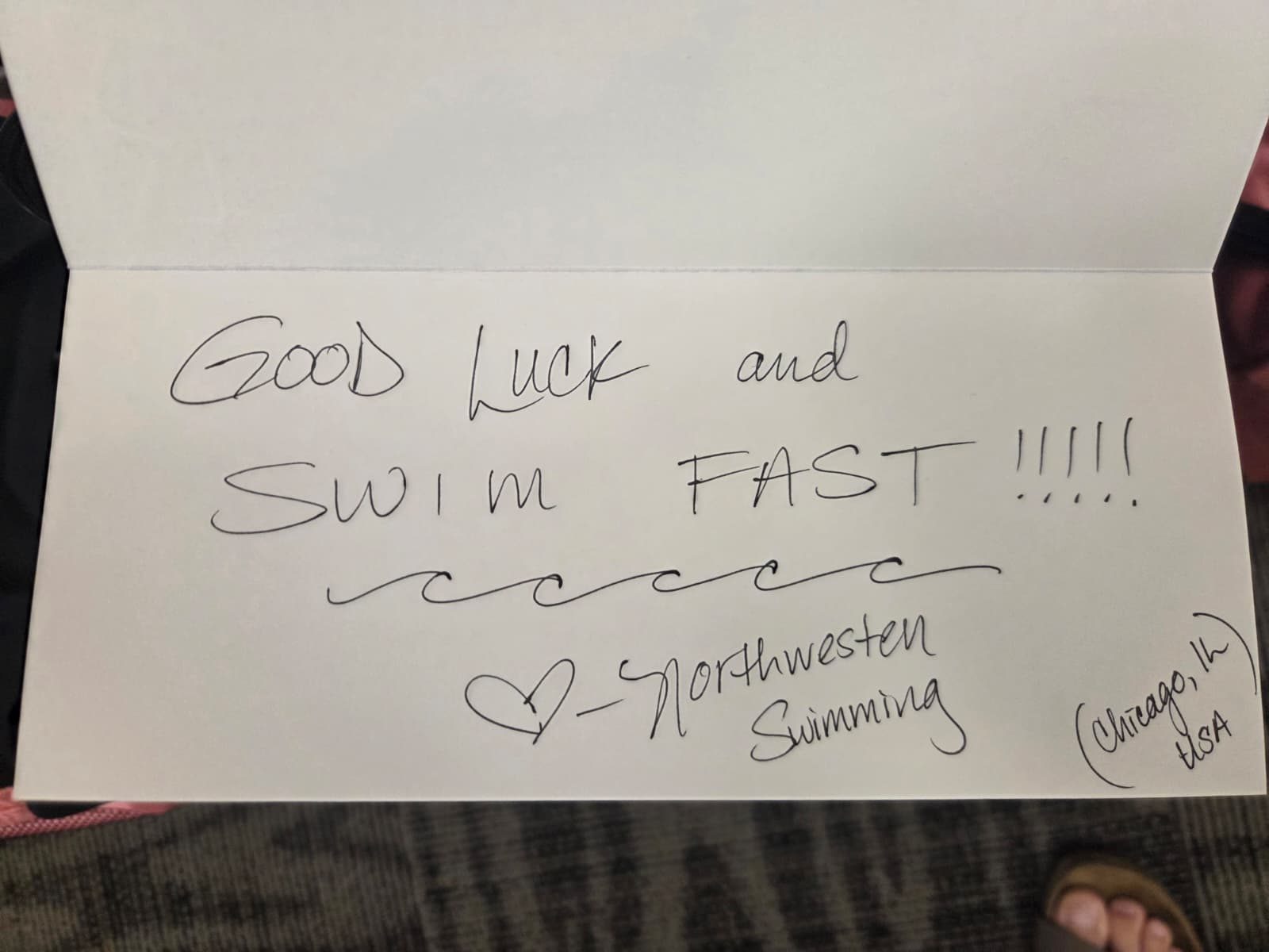 A handwritten good-luck note sent with donated equipment